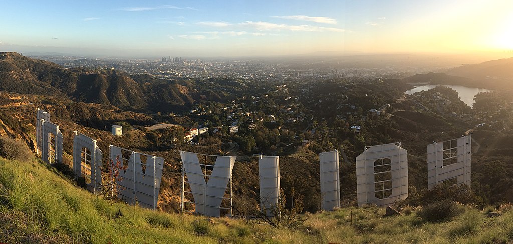 View from behind Hollywood Sign overlooking Los Angeles cityscape
