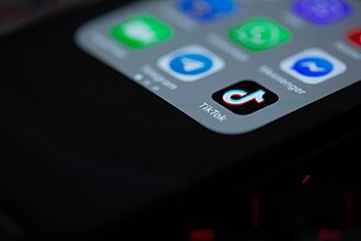 TikTok app icon on a smartphone screen