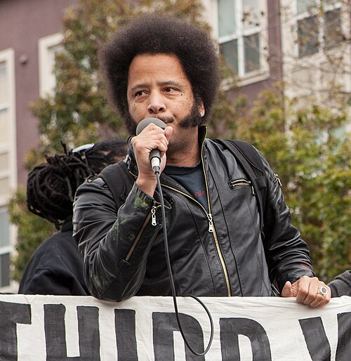 Boots Riley speaking at a public event in January 2016