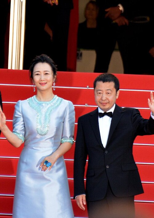 Jia Zhangke with actress Zhao Tao at the 2018 Cannes Film Festival