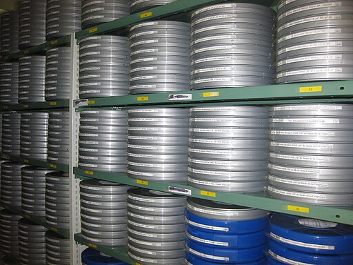Film archive cold storage room holding reels of historical footage at a cinematheque