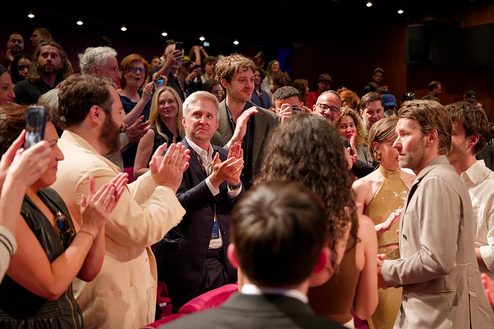 Cast and crew receiving a standing ovation at the Cannes Film Festival 2025 premiere of The Plague