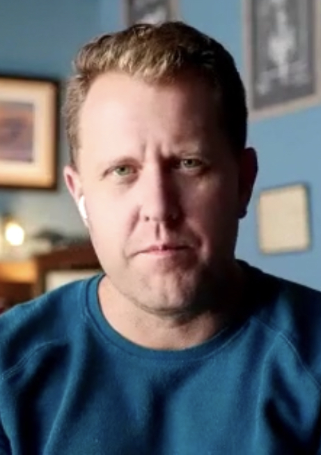 Jon Erwin director photographed at a 2021 event