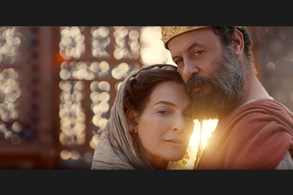 Intimate scene of couple with dramatic backlit lighting