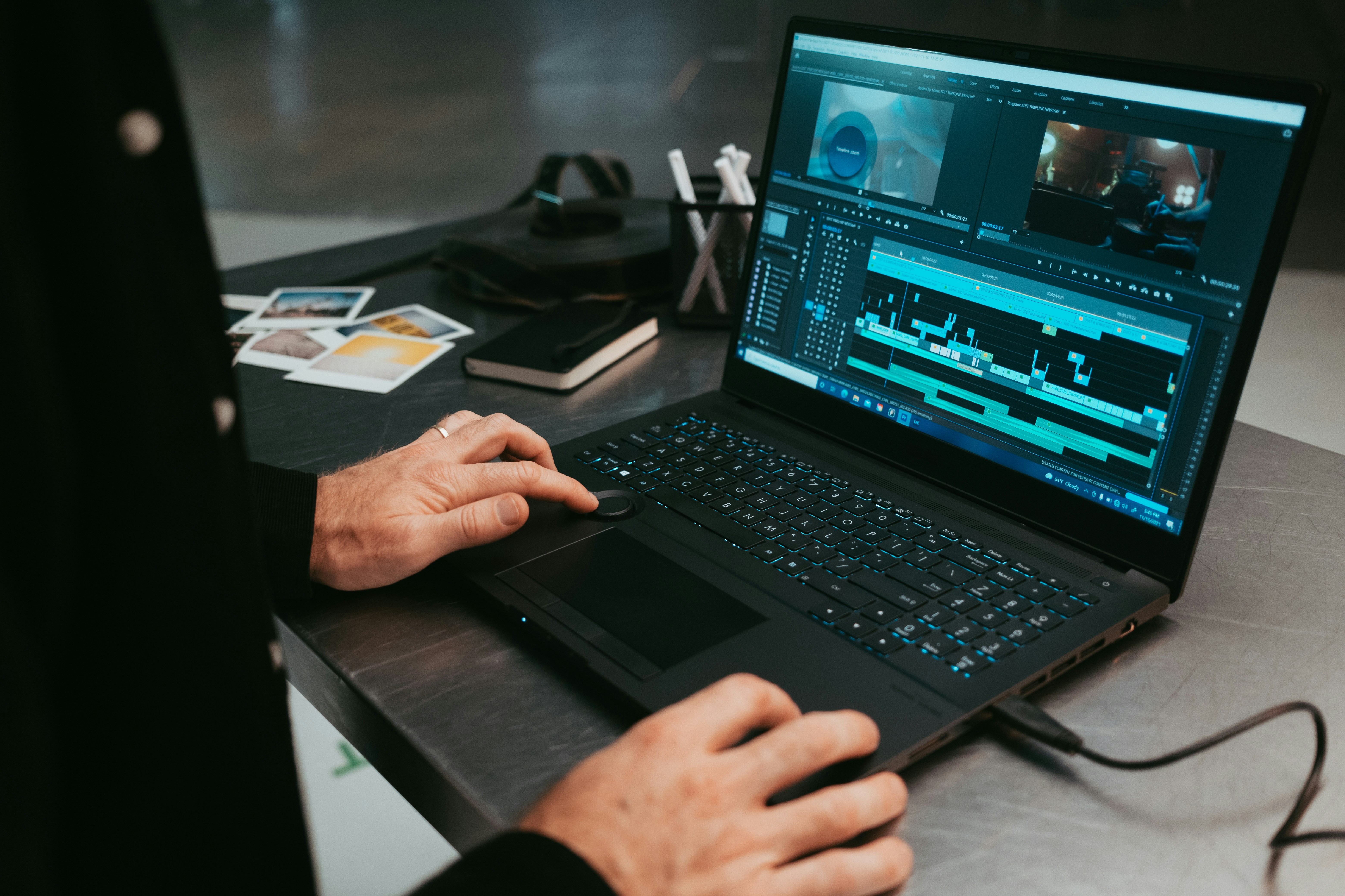 Professional video editing setup with laptop and timeline