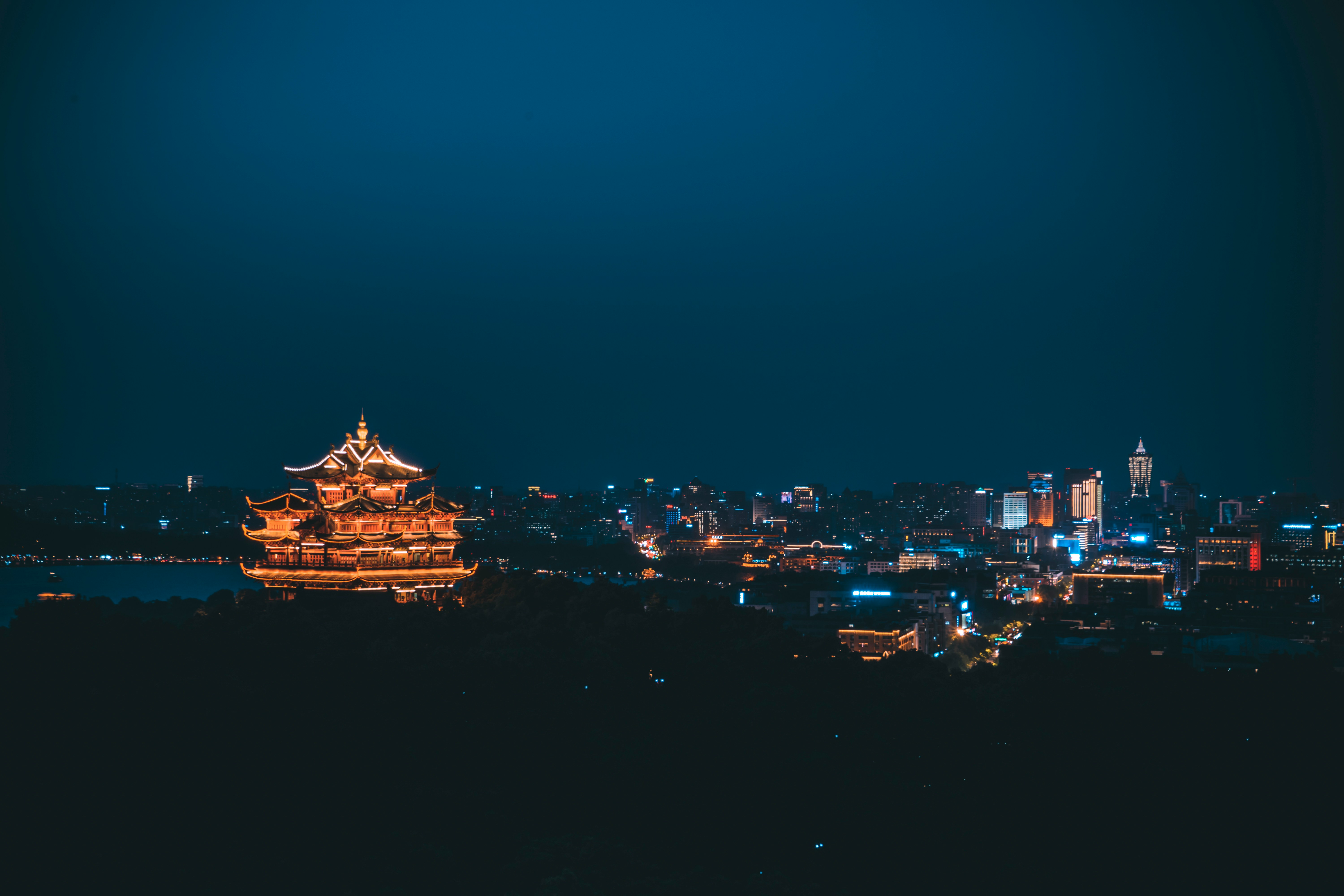 Panoramic view of a Chinese city at night from an elevated vantage point
