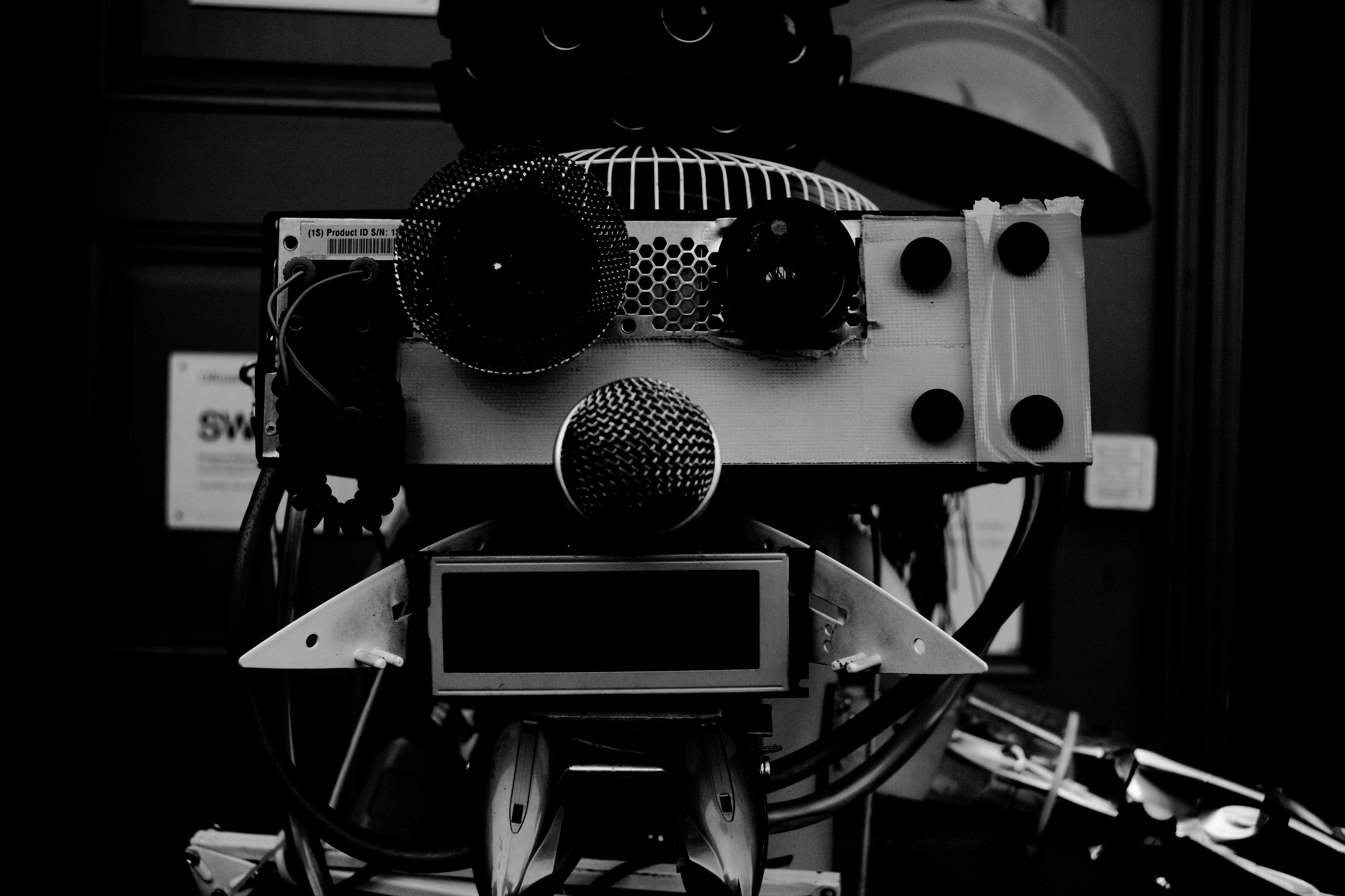 Grayscale photograph of assorted recording studio equipment