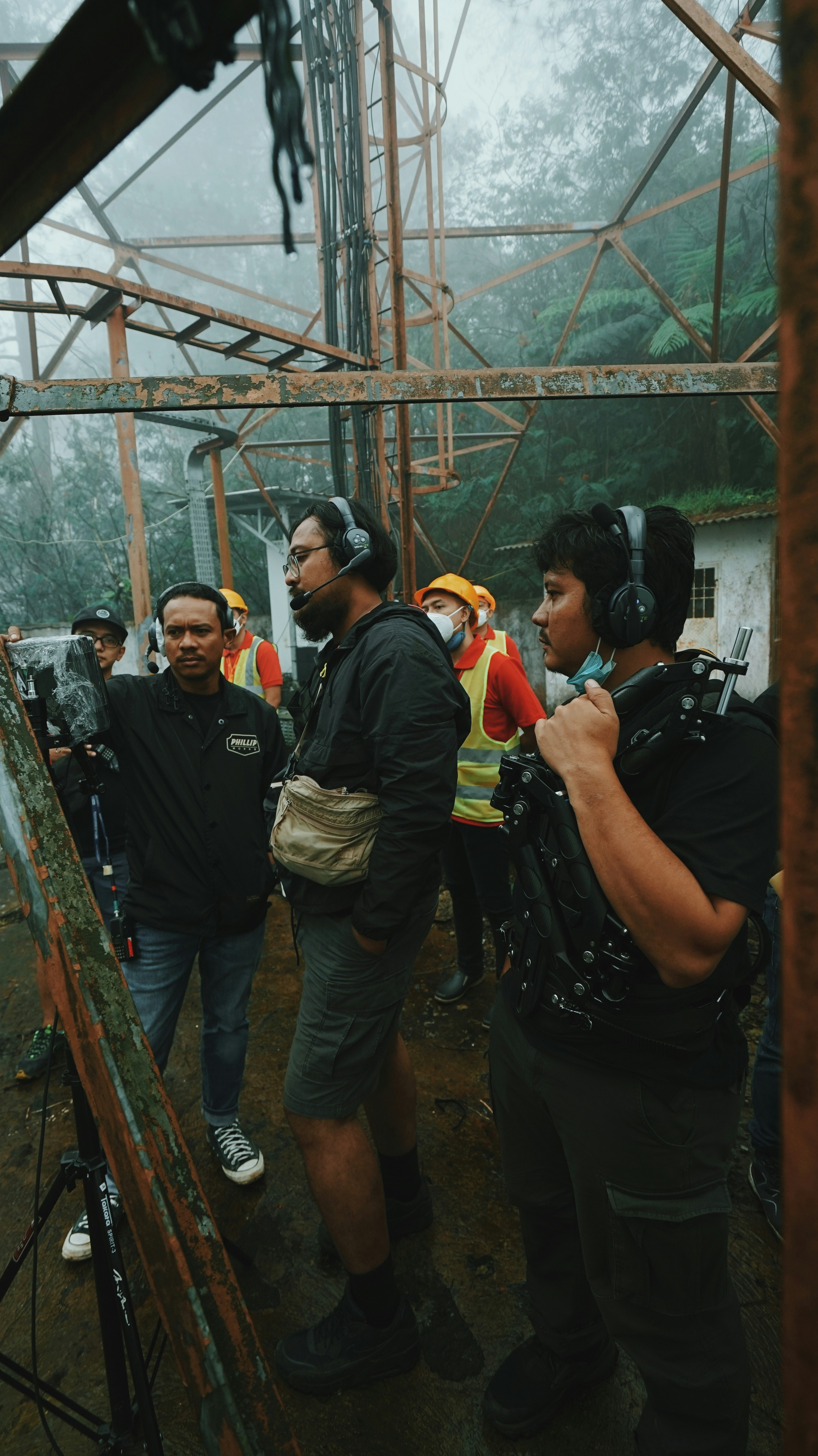 Traditional film crew on set with camera equipment