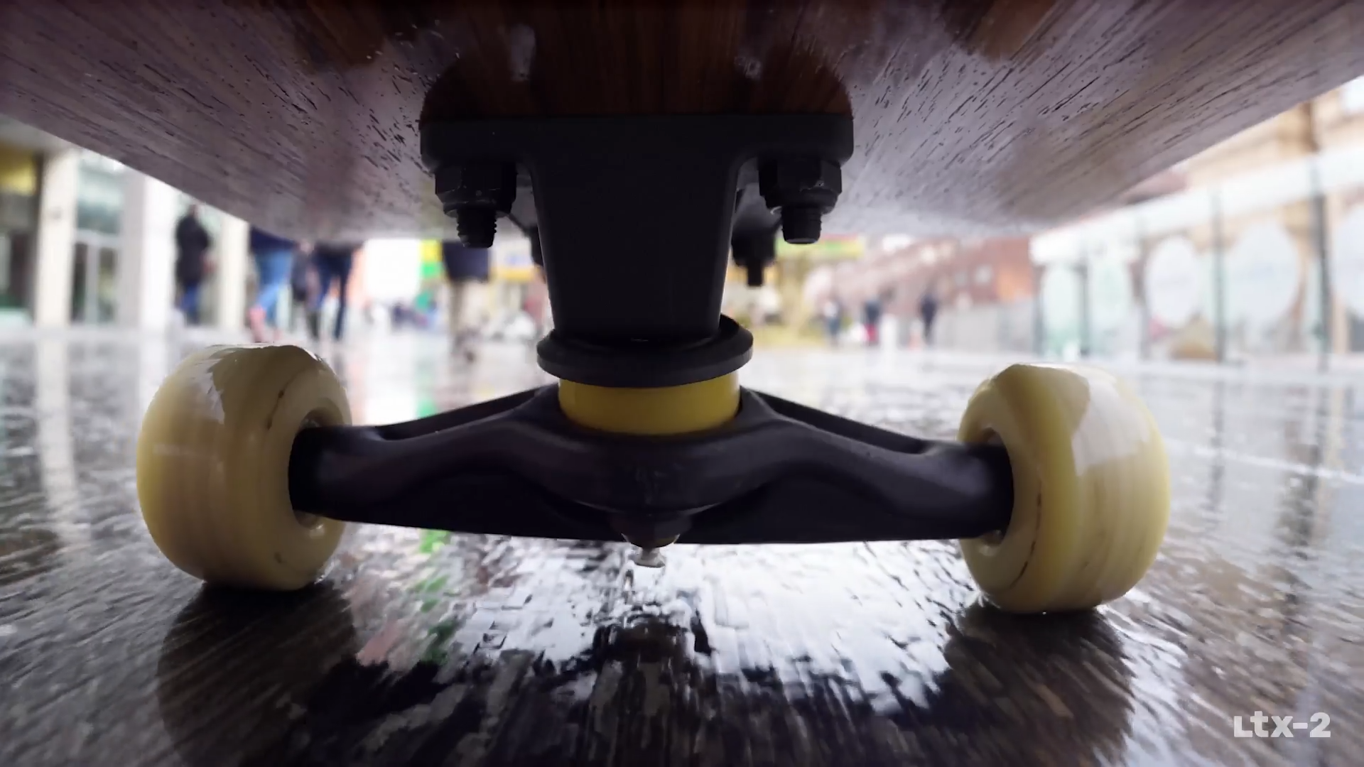 Low angle skateboard shot with motion blur showing dynamic camera movement and speed representation